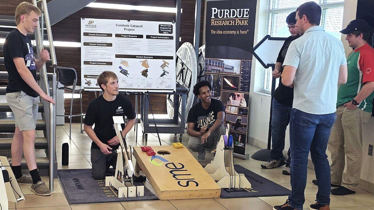 Students showcasing a catapult project at the most recent Boilermaker Showcase. (Photo provided: Joseph Dues)