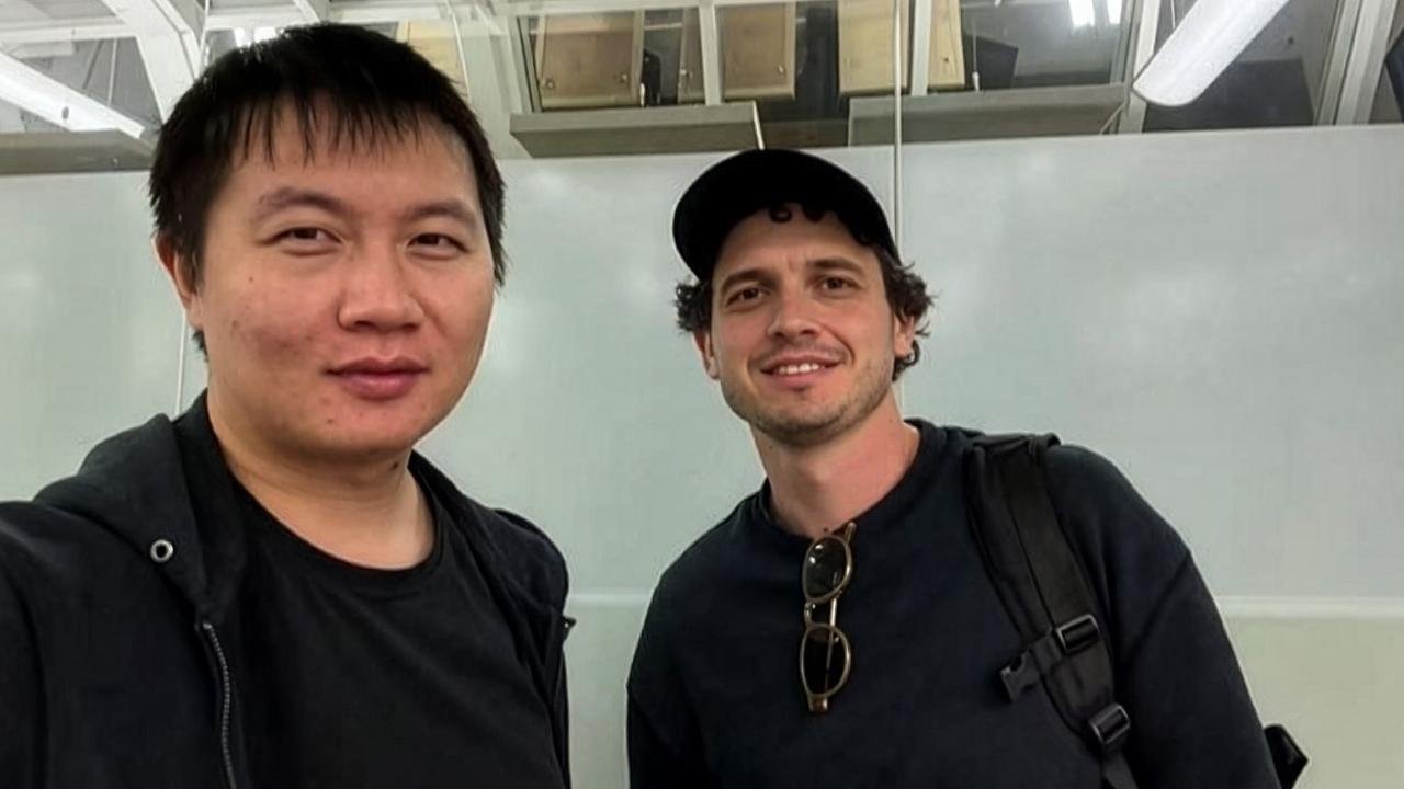 Purdue Polytechnic graduate Dr. Jin Wu (left) with Reflection AI co-founder Dr. Misha Laskin (right).