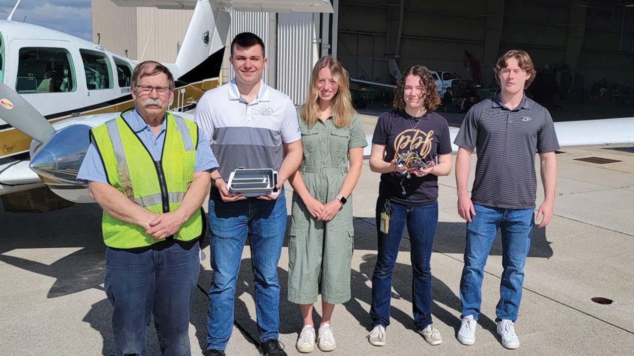 Project customer/mentor and student design team pictured left to right: Brian Stirm, Lukas Johnson, Claudia Buddenbaum, Anna Carl and Riley Hammond. (Photo provided/Timothy Ropp)