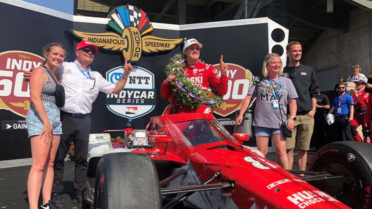 Mike O'Gara (second from left), a 1994 Purdue mechanical engineering technology graduate, helped coach Marcus Ericsson to victory in the 2022 Indy 500. (WRTV)