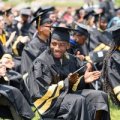 Purdue Polytechnic High School graduates at their 2021 commencement ceremony. This ceremony marked the first time the network graduated students from its PPHS Schweitzer Center at Englewood, North and South Bend campuses. (Purdue University/Rebecca McElhoe)