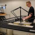 A student works on a prototype of a bicycle manufacturing line