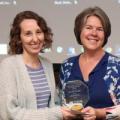Sarah Prater (left) receives Purdue Polytechnic's customer service award from Dean Carrie Berger