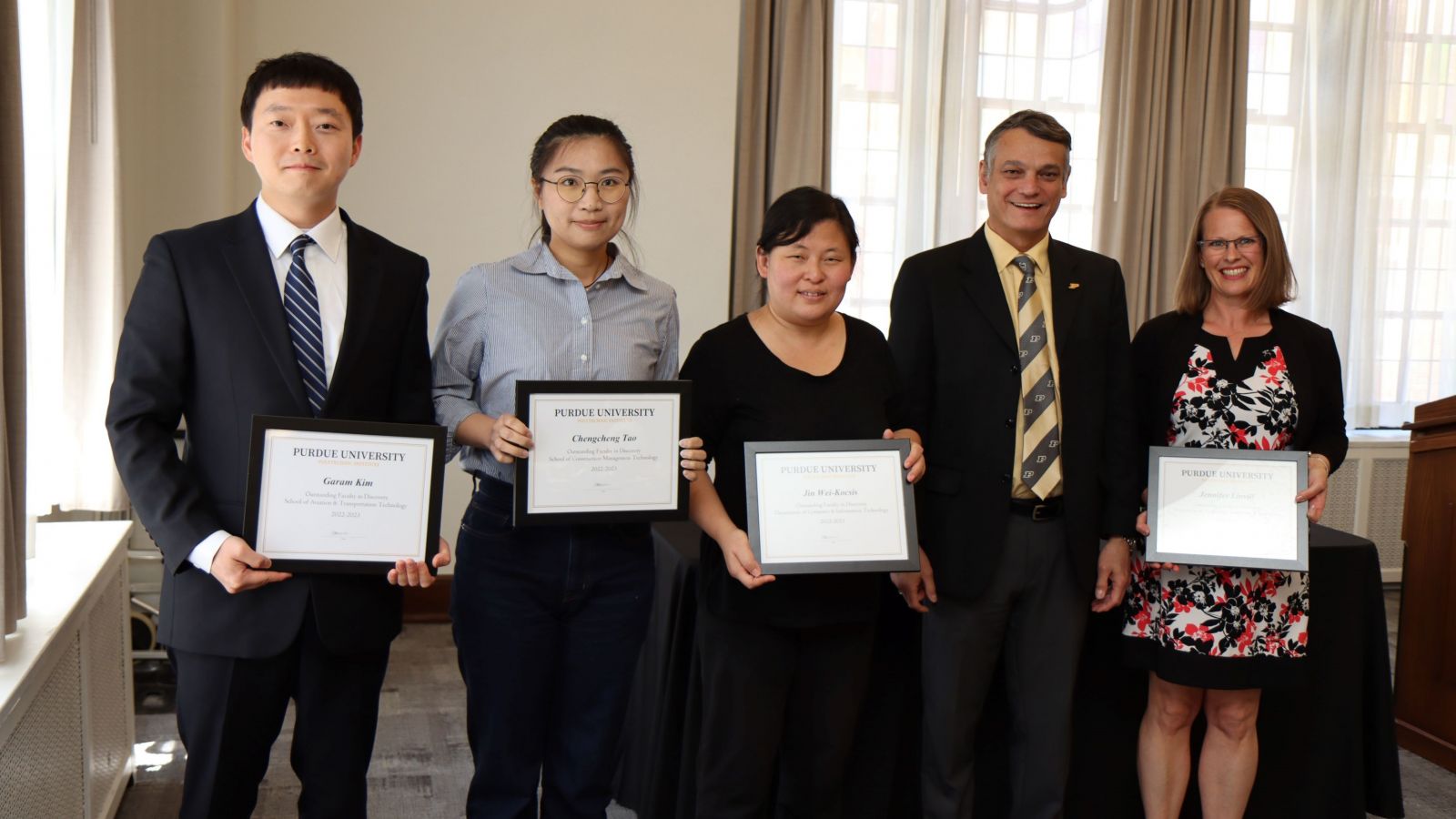 Outstanding Faculty in Discovery nominees (Garam Kim, Chengcheng Tao, Jin Wei-Kocsis and Jennifer Linvill) with Daniel Castro. (Purdue University photo/John O'Malley)