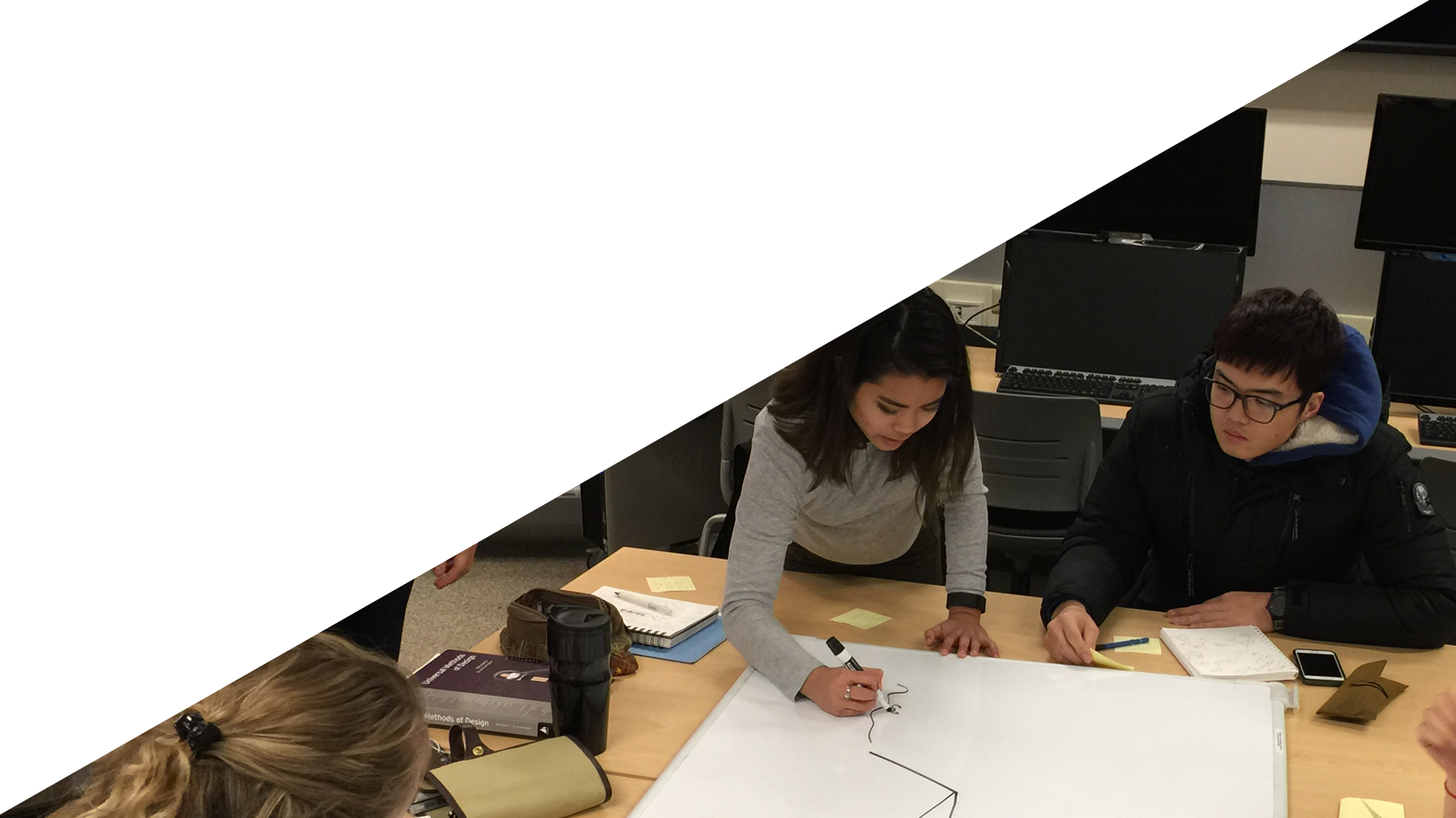 students working together to solve design problem